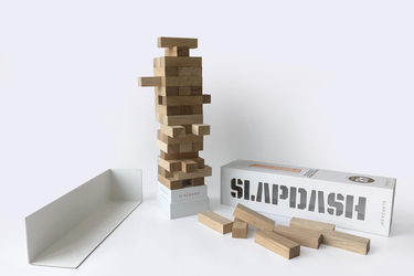 Slapdash is Komarc's version of wood stacking game with a touch of delicate box design